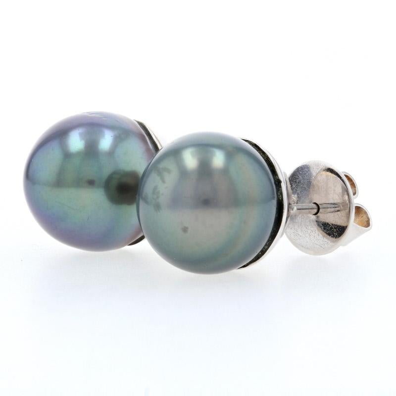 If you marvel at the ocean's many wonders, this exquisite pair of earrings will bring you joy! These 18k white gold stud earrings showcase large Tahitian pearls that display a gorgeous luster for a stunning presentation from every angle.    

Metal