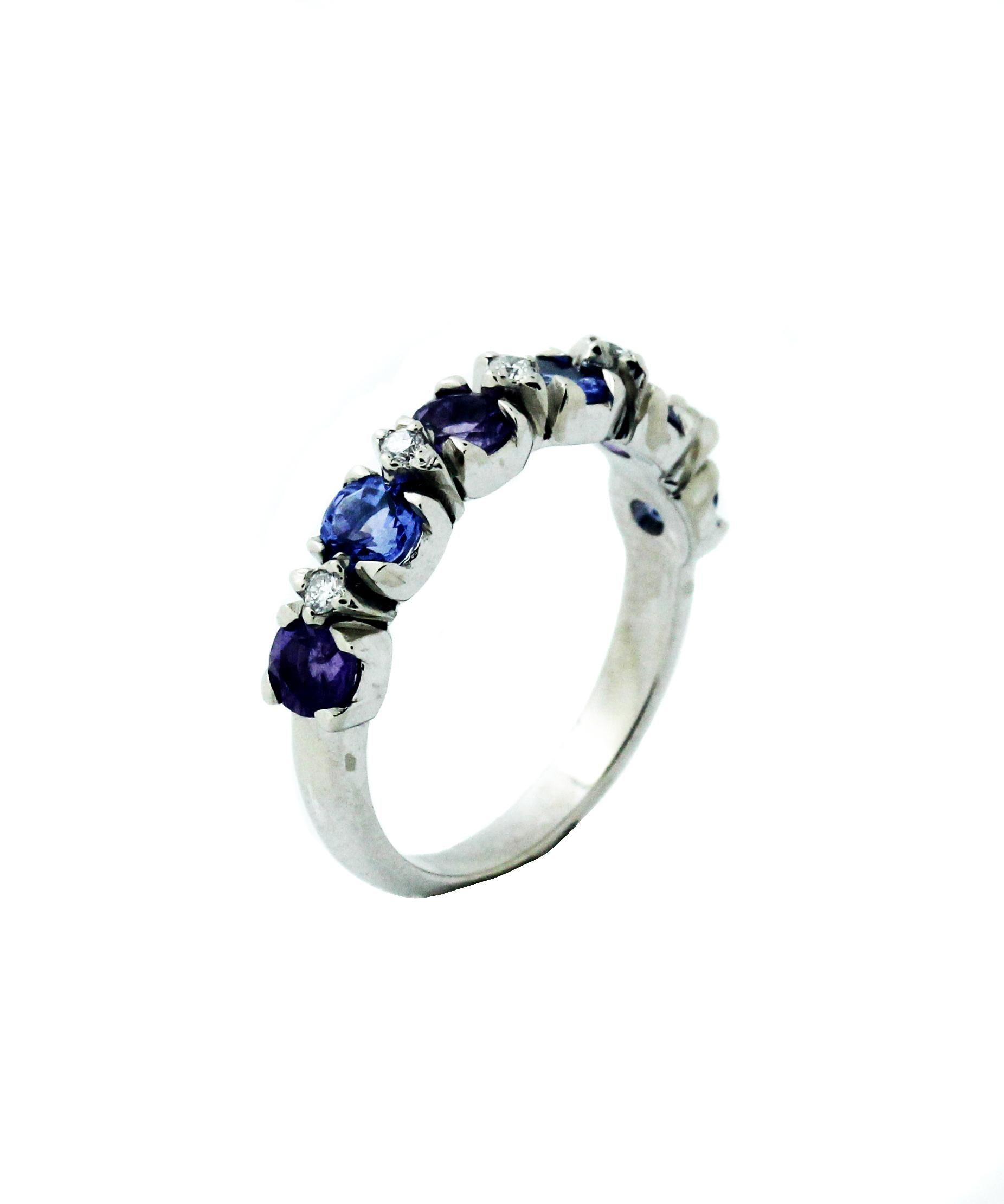 14K White Gold Amethyst Diamond and Tanzanite Half Band Ring

1.50 carat Tanzanite gorgeous blue/purple color
1.00 carat Amethyst

Just a touch of diamonds in between the Tanzanites and Amethyst 0.05 carat diamonds

Ring is 4mm thick

Size 6.5.