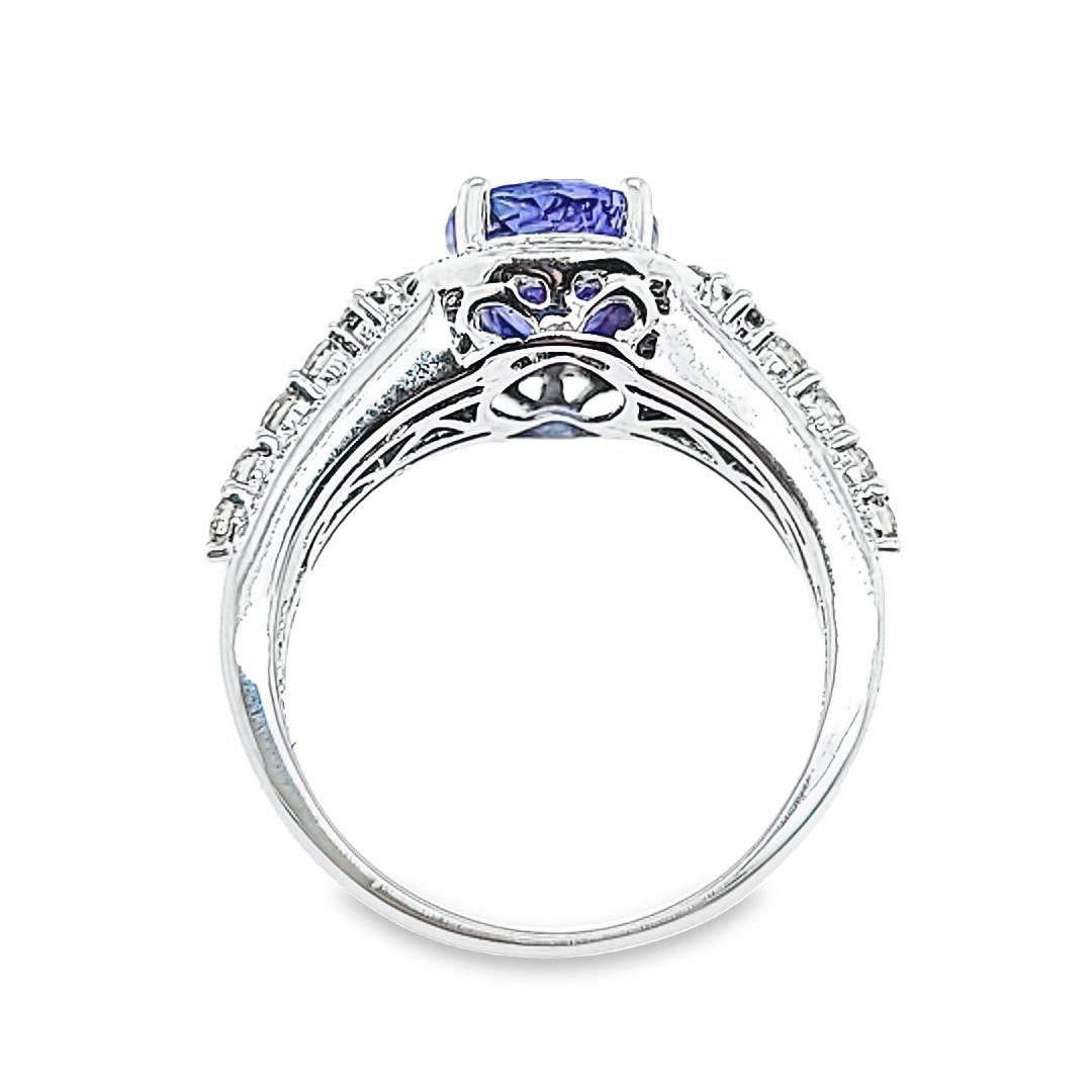 Oval Cut White Gold, Tanzanite, and Diamond Ring For Sale