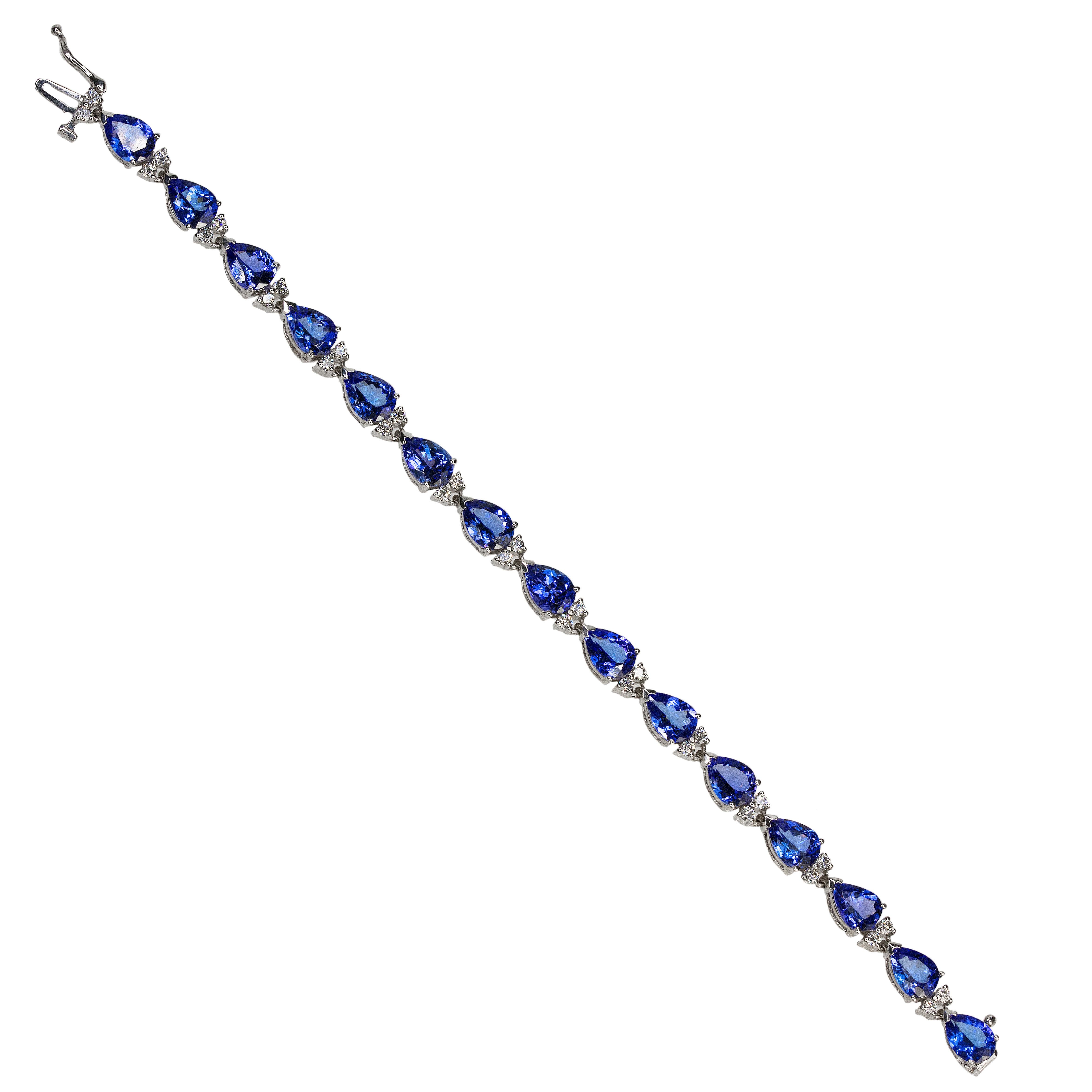 14kw Bracelet containing 15 pear shape Tanzanites weighing approximately 20.00 carats and 30 round brilliant diamonds weighing approximately 1.20 carats. 14.89g