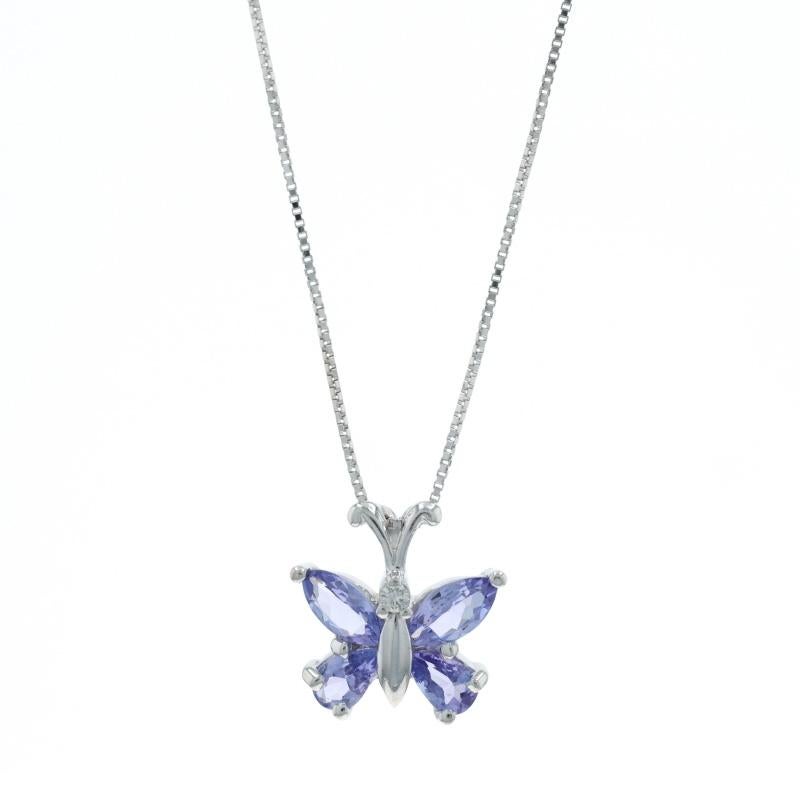 Metal Content: 14k White Gold

Stone Information

Natural Tanzanite
Treatment: Routinely Enhanced
Carat(s): .80ctw
Cut: Marquise & Pear

Natural Diamonds
Carat(s): .02ct
Cut: Round Brilliant
Color: I
Clarity: SI1

Total Carats: .82ctw

Chain Style: