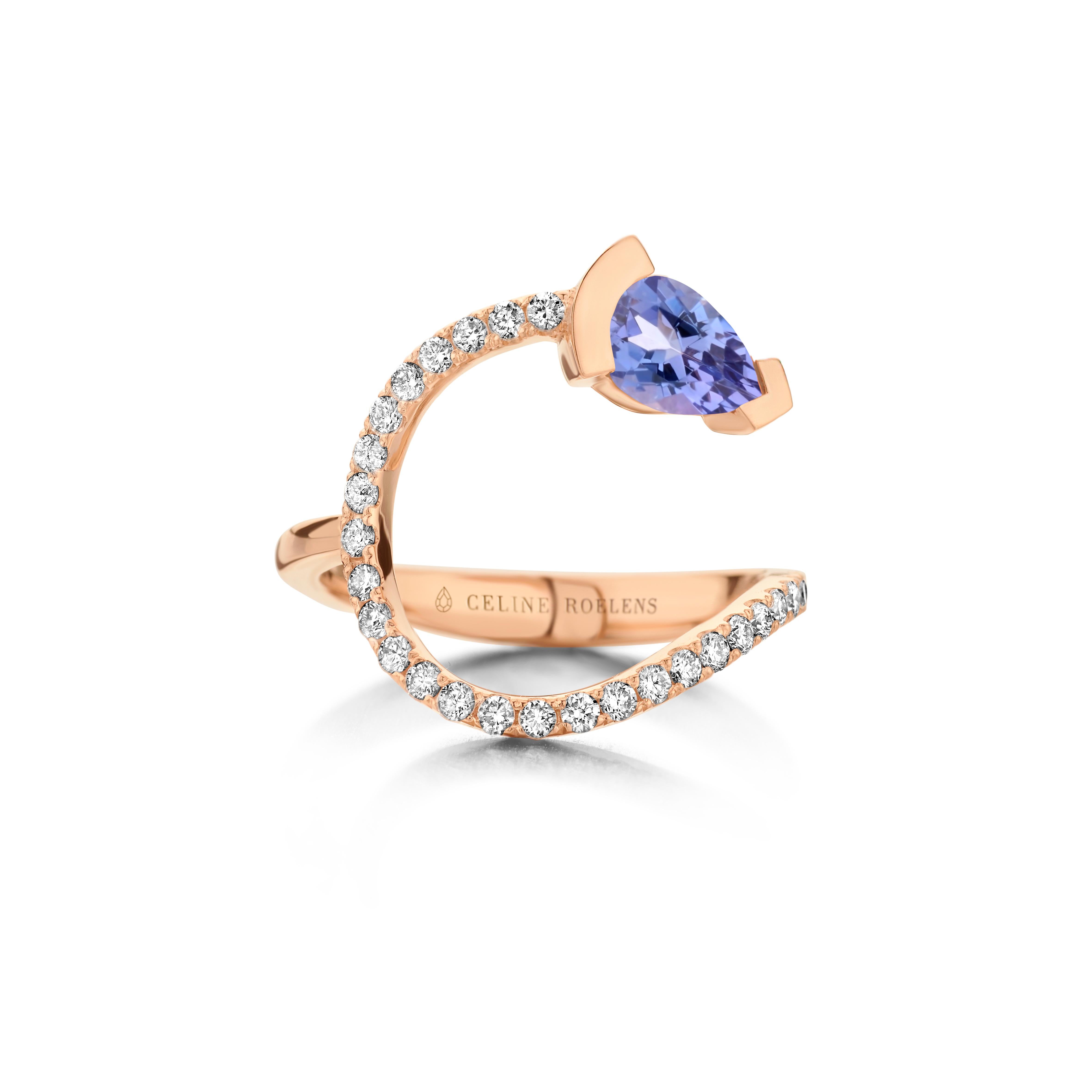 ADELINE curved ring in 18Kt white gold set with a pear shaped Tanzanite and 0,33 Ct of white brilliant cut diamonds - VS F quality.