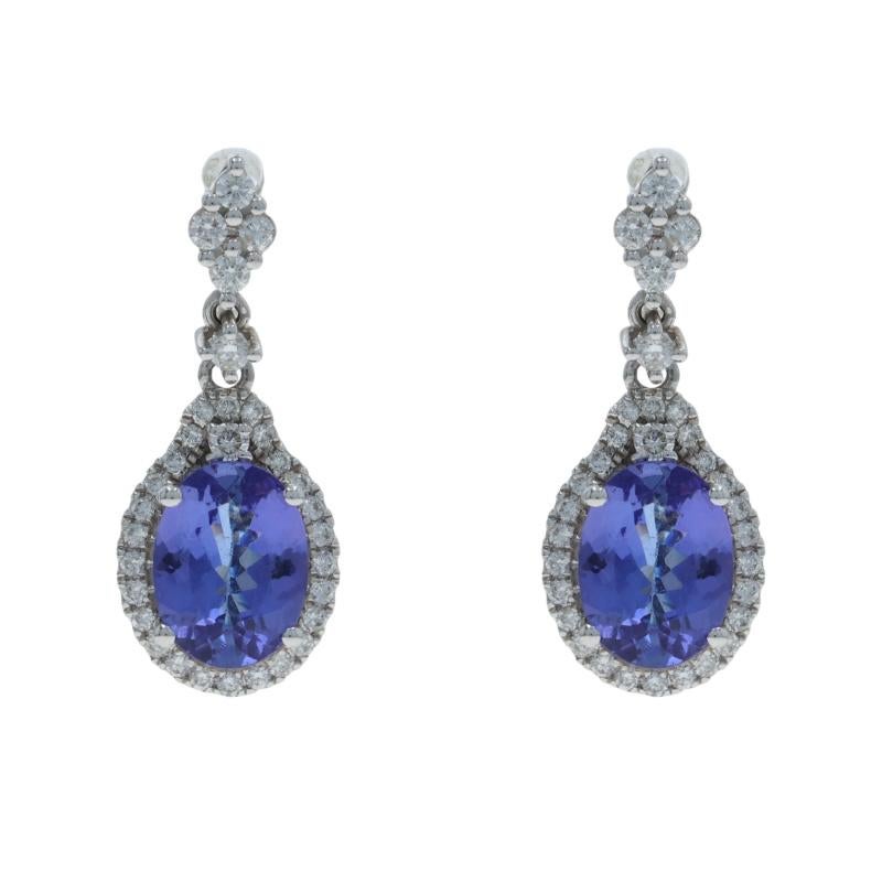 Contenu métallique : Or blanc 14k

Informations sur les pierres

Tanzanite naturelle
Traitement : Amélioration de routine
Carat(s) : 2.70ctw
Coupe : Ovale

Diamants naturels
Carat(s) : .50ctw
Coupe : Brillant rond
Couleur : G - H
Clarté : SI2 -