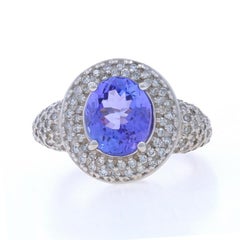 Anillo de oro blanco con halo de tanzanita y diamantes - 14k Oval 3.43ctw