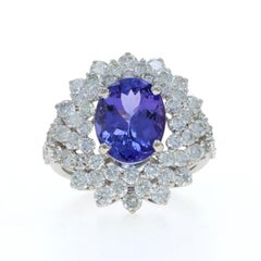 White Gold Tanzanite Diamond Halo Ring - 18k Oval 6.13ctw Floral