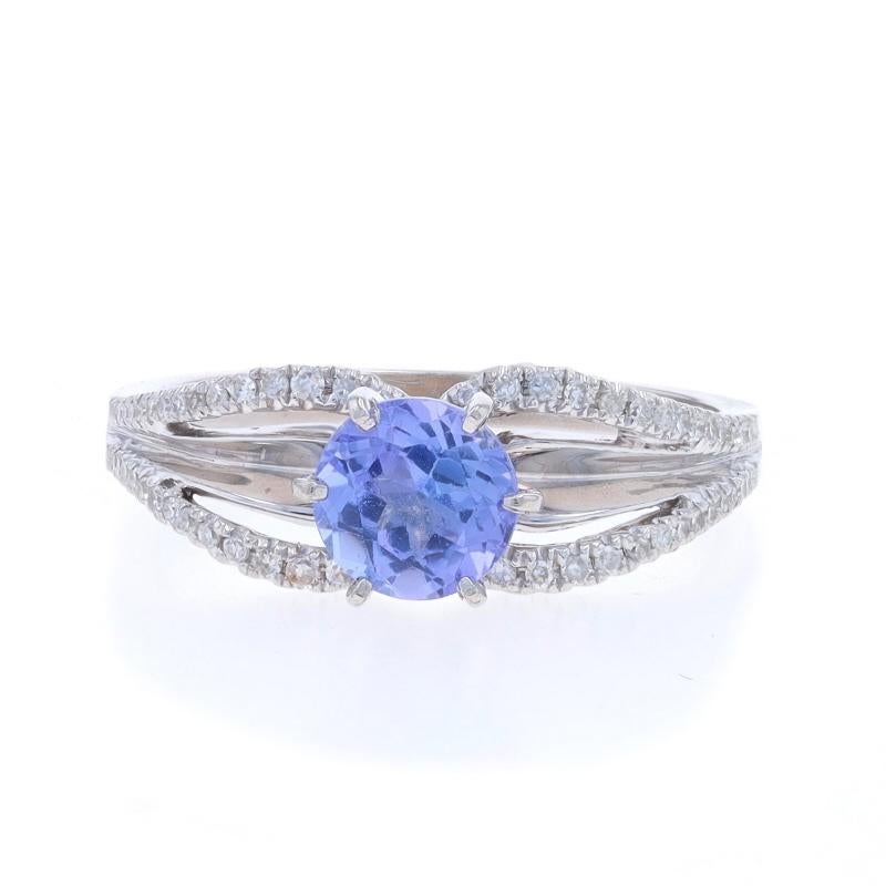 Size: 6 3/4
Sizing Fee: Up 2 1/2 sizes for $35 or Down 2 sizes for $35

Metal Content: 10k White Gold

Stone Information

Natural Tanzanite
Treatment: Routinely Enhanced
Carat(s): .75ct
Cut: Round
Color: Purple

Natural Diamonds
Carat(s):