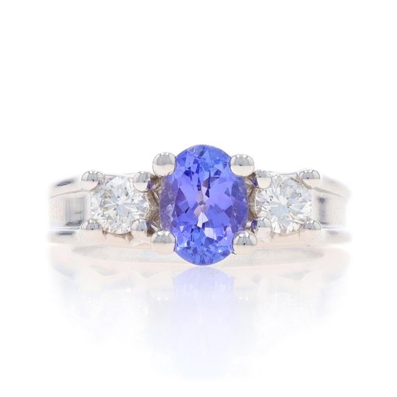 Size: 4 1/2
Sizing Fee: Up 2 sizes for $40 or Down 1/2 a size for $30

Metal Content: 14k White Gold

Stone Information

Natural Tanzanite
Carat(s): .74ct
Cut: Oval
Color: Purple

Natural Diamonds
Carat(s): .32ctw
Cut: Round Brilliant
Color: G -