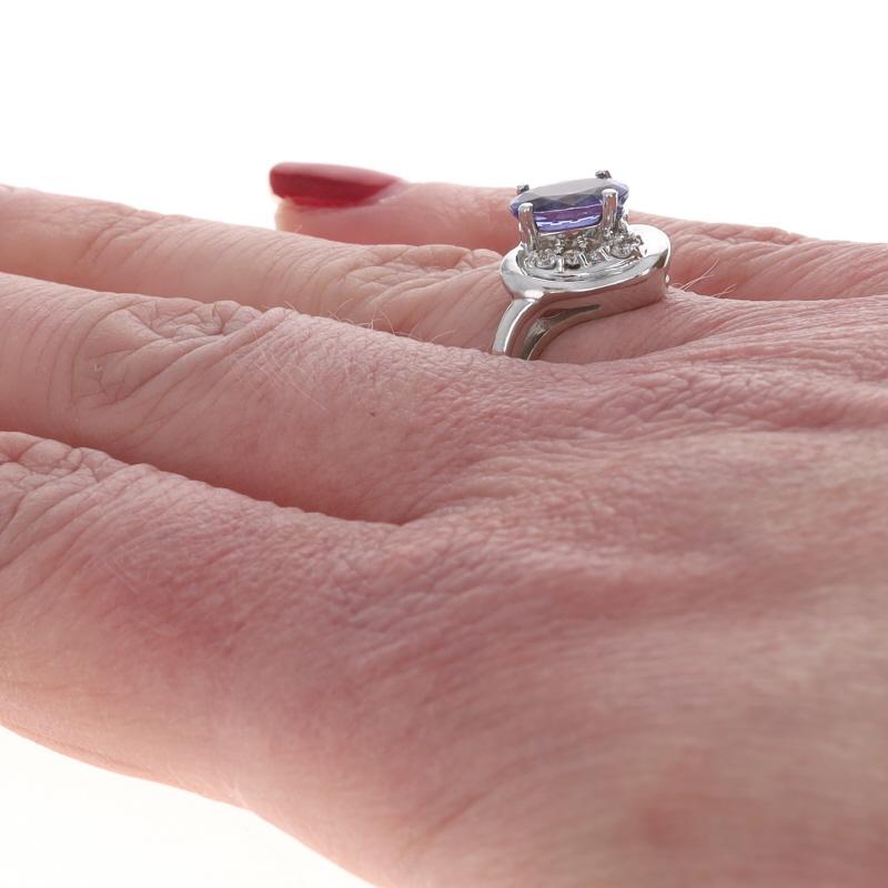 Women's White Gold Tanzanite Diamond Ring - 14k Oval 1.68ctw For Sale