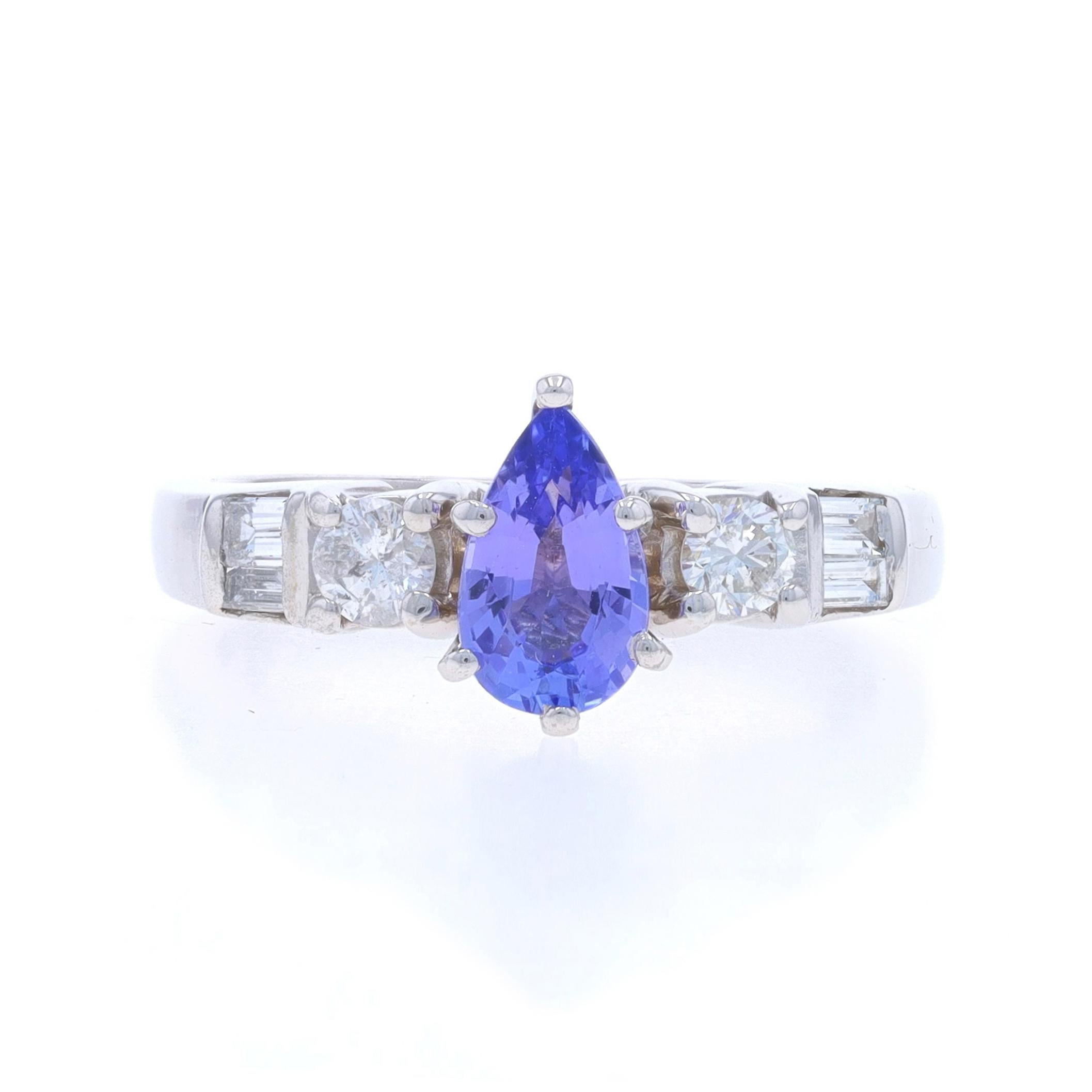 Size: 7 3/4
Sizing Fee: Up 1/2 a size for $40 or Down 1 size for $40

Metal Content: 14k White Gold

Stone Information

Natural Tanzanite
Treatment: Routinely Enhanced
Carat(s): .86ct
Cut: Pear
Color: Purple

Natural Diamonds
Carat(s): .40ctw
Cut: