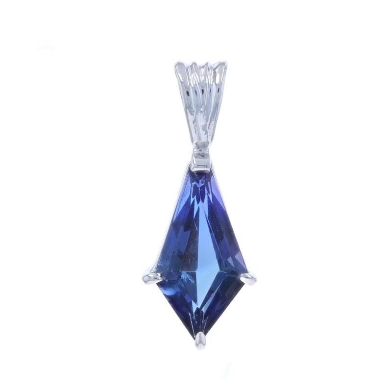 Metal Content: 14k White Gold

Stone Information

Natural Tanzanite
Treatment: Routinely Enhanced
Carat(s): 2.28ct
Cut: Kite
Color: Bluish Purple

Total Carats: 2.28ct

Style: Solitaire

Measurements

Tall (from stationary bail): 29/32