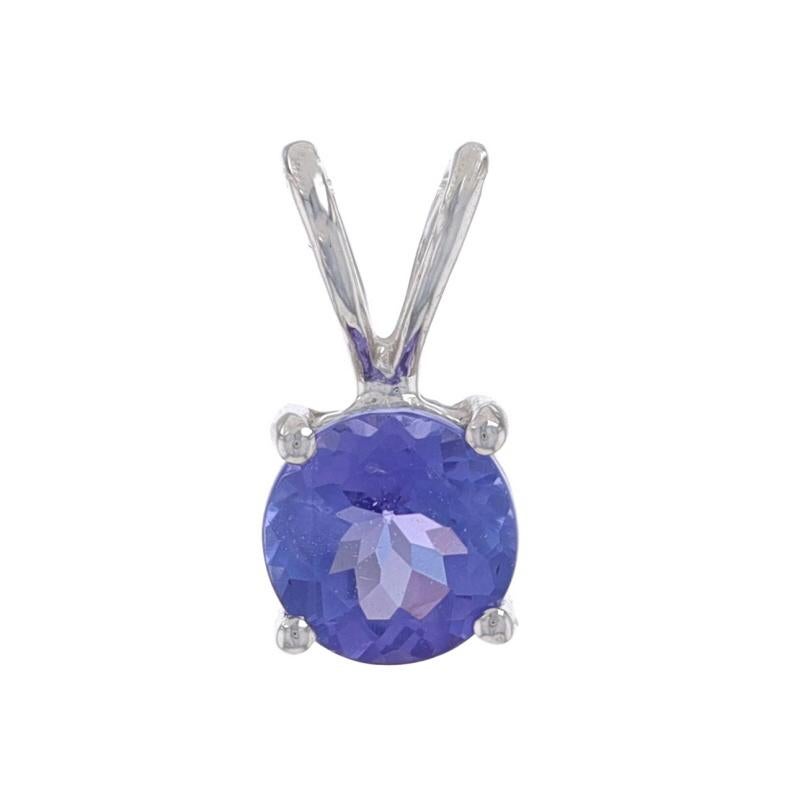 Metal Content: 14k White Gold

Stone Information
Natural Tanzanite
Treatment: Routinely Enhanced
Carat(s): .45ct
Cut: Round
Color: Purple

Total Carats: .45ct

Style: Solitaire

Measurements
Tall (from stationary bail): 13/32