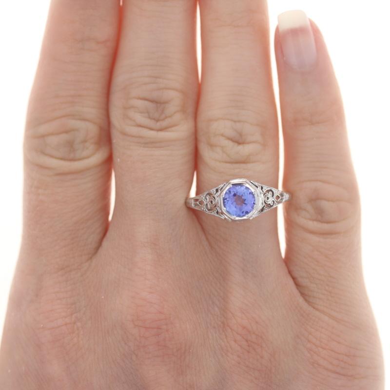 Size: 9 1/2
Sizing Fee: Down 1 size or up 2 sizes for $40

Metal Content: 18k White Gold

Stone Information

Natural Tanzanite 
Treatment: Routinely Enhanced 
Carat(s): .80ct
Cut: Round

Total Carats: .80ctw

Style: Solitaire
Features: Art-Deco