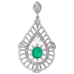 White gold tear drop brooch with center cabochon emerald and accent diamonds