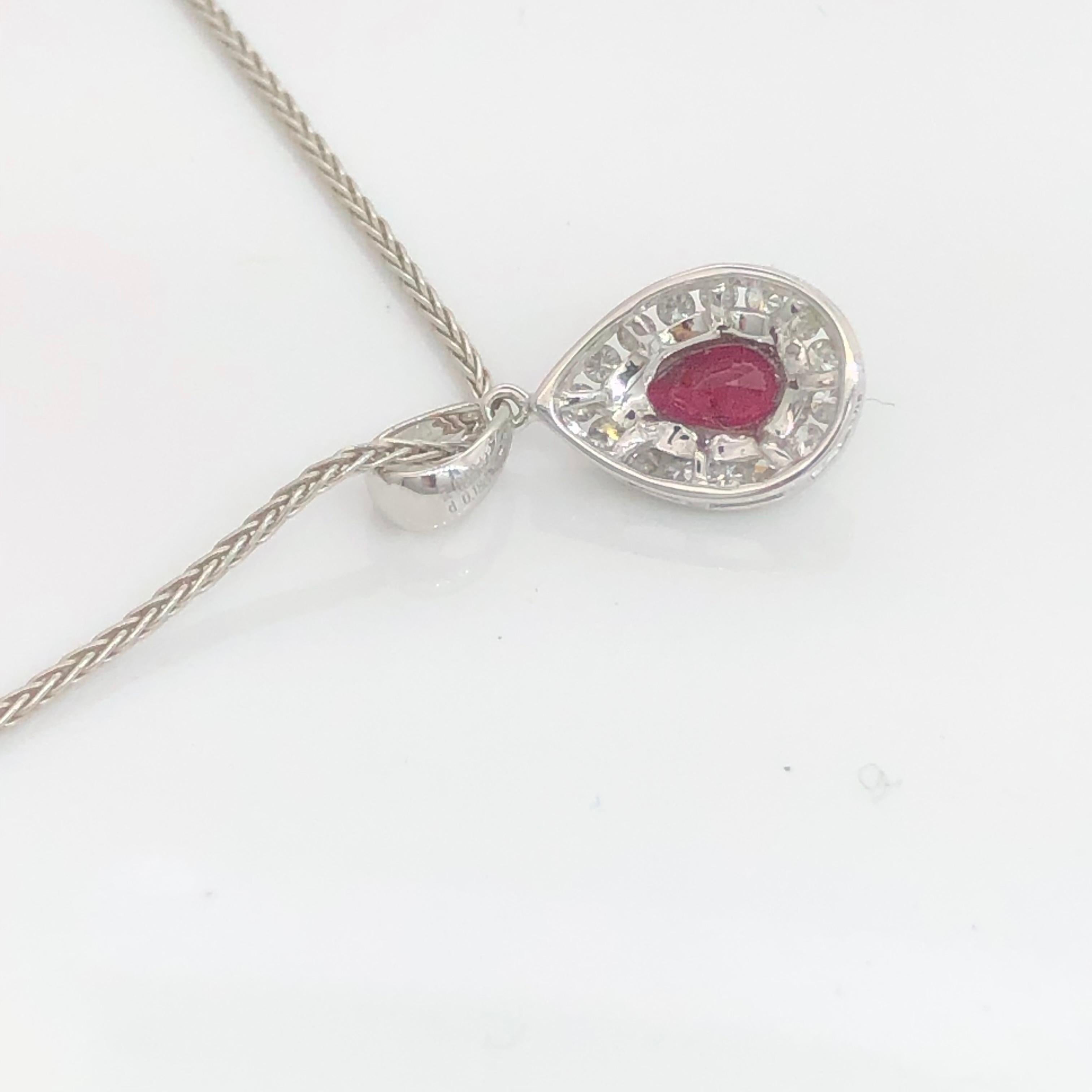 Women's White gold teardrop pendant set with pear shape natural ruby and  diamonds For Sale