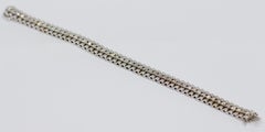 Bracciale Tennis in oro bianco, con 52 diamanti rotondi incastonati, per un totale di 5 carati