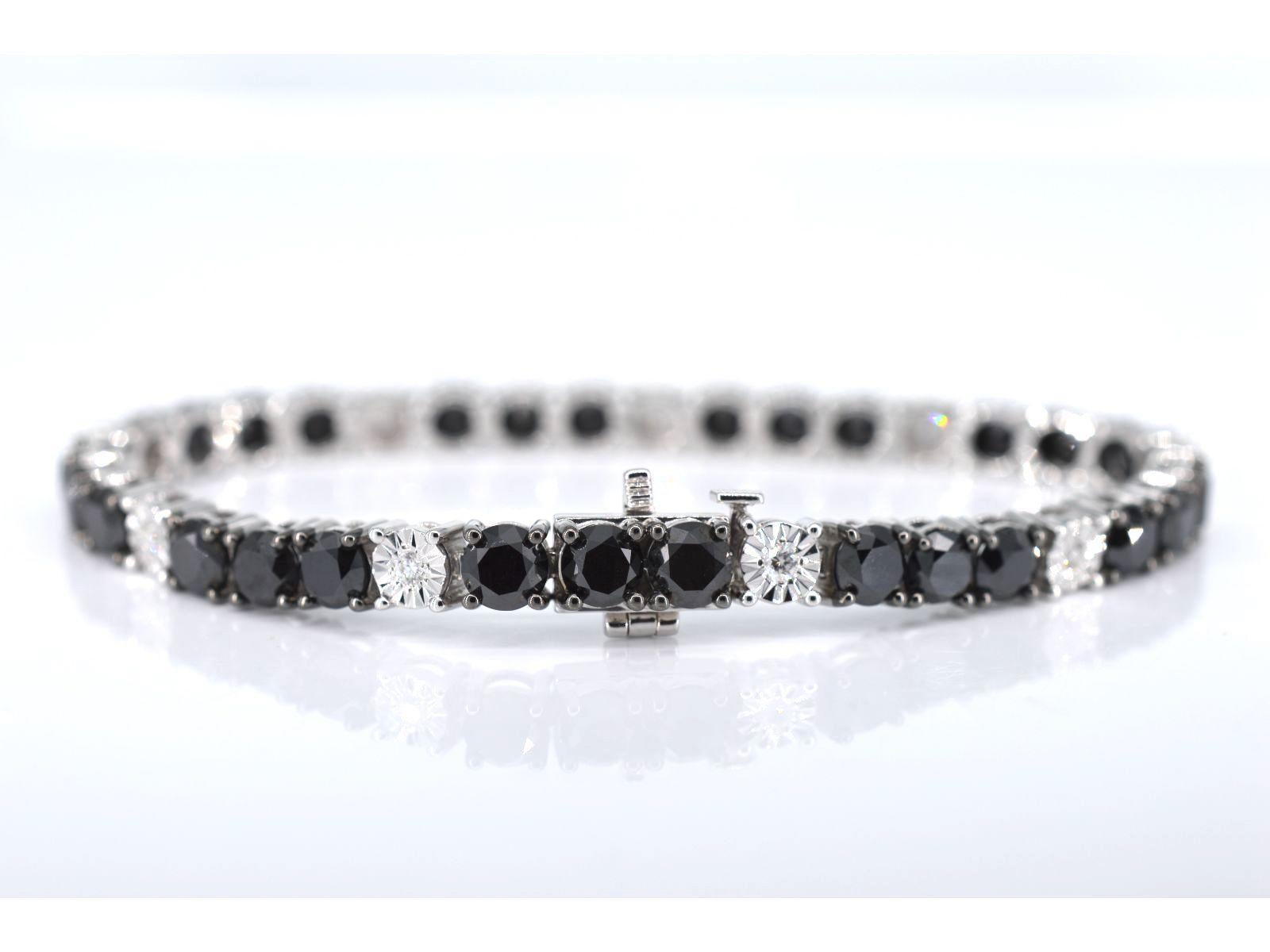 Contemporary White Gold Tennis Bracelet Set with Black and White Diamonds For Sale