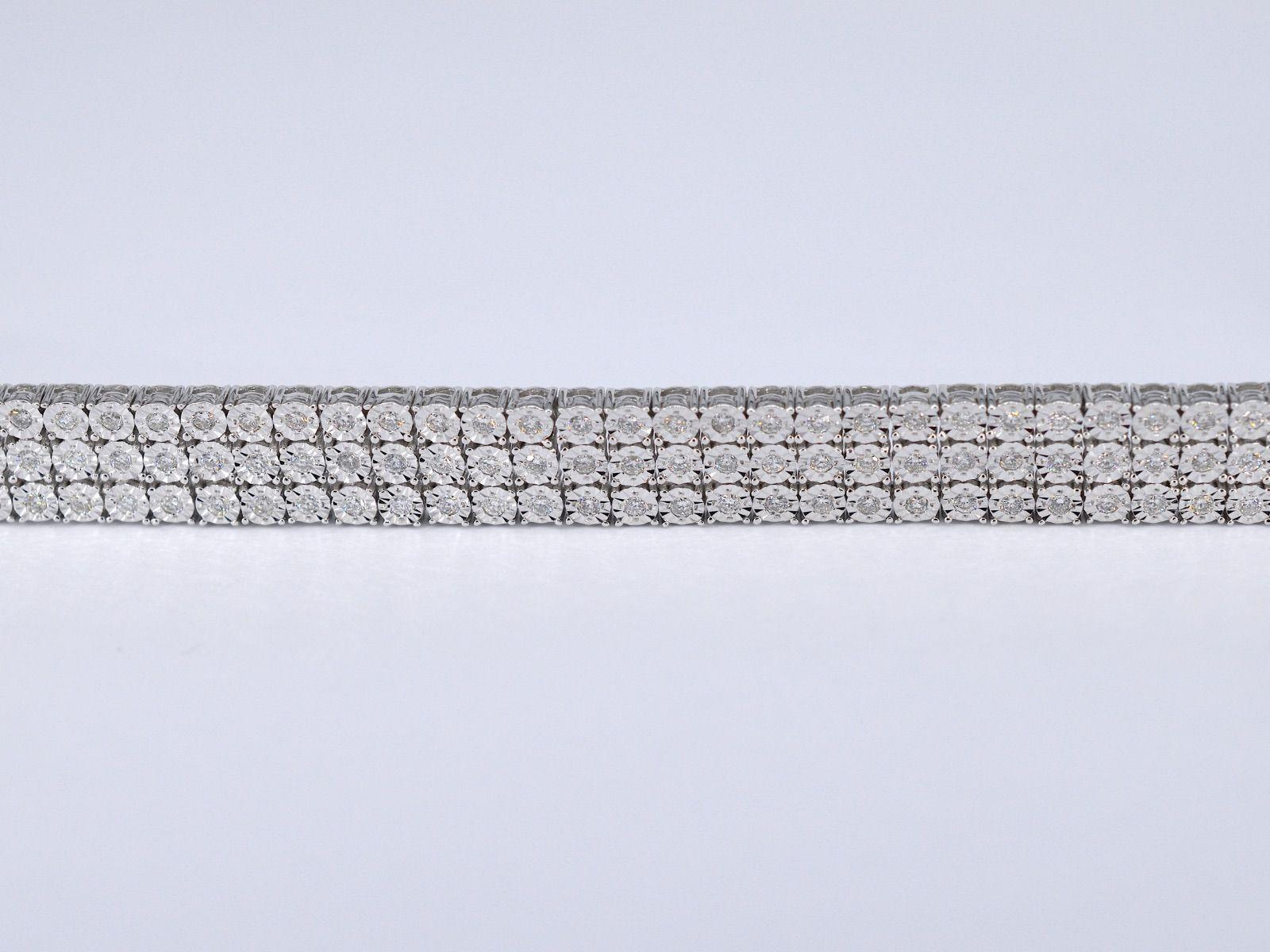 Contemporary White Gold Tennis Bracelet with 3 Rows of Diamonds, 2.25 Carat For Sale