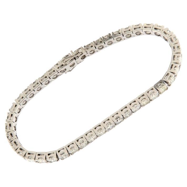 White gold tennis bracelet with 9.13 ct brilliant cut diamonds For Sale
