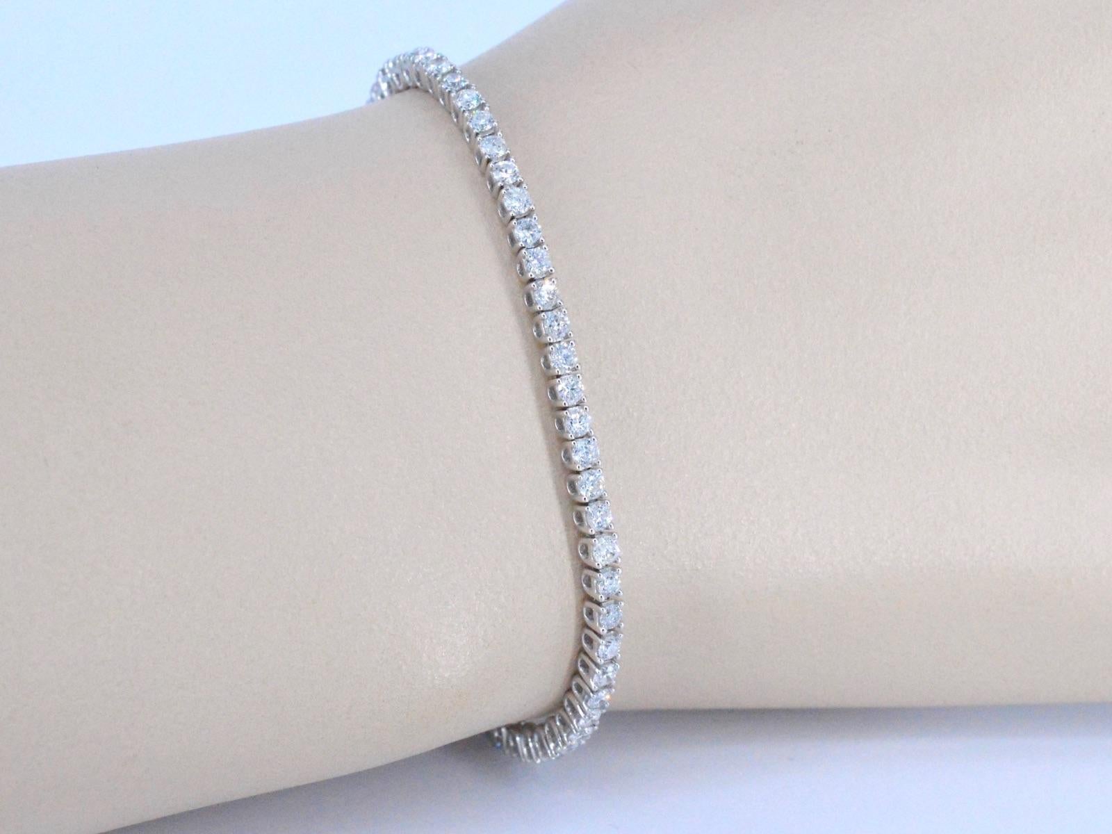 Introducing our exquisite white gold tennis bracelet with diamonds. This stunning piece features 3.50 carats of brilliant cut diamonds, with a beautiful F-G colour and SI-P clarity. The bracelet itself weighs in at 8.0 grams and measures 18cm in