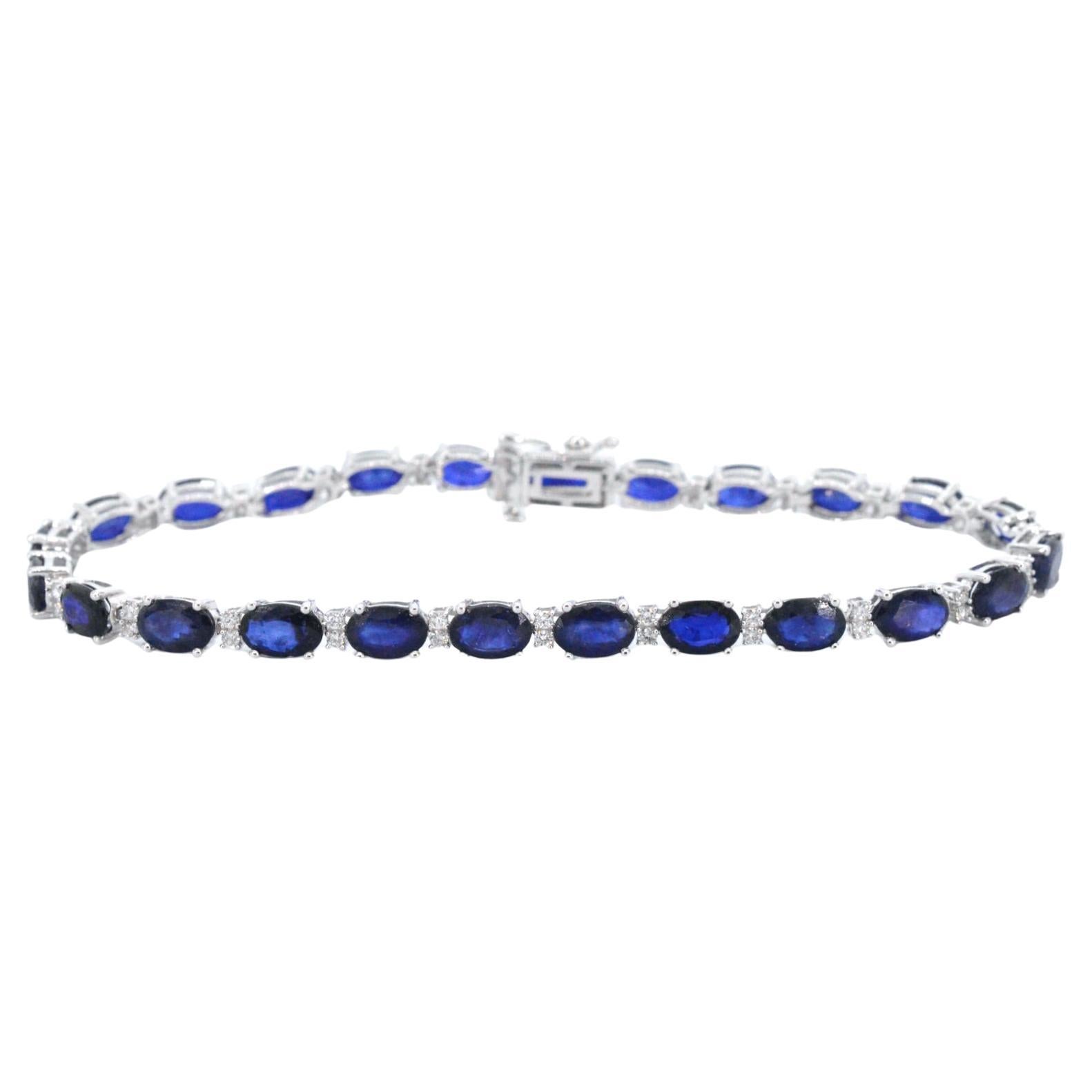 White gold tennis bracelet with diamonds and sapphire