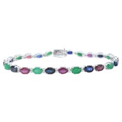 Bracelet tennis en or blanc avec diamants, saphirs, rubis et émeraudes