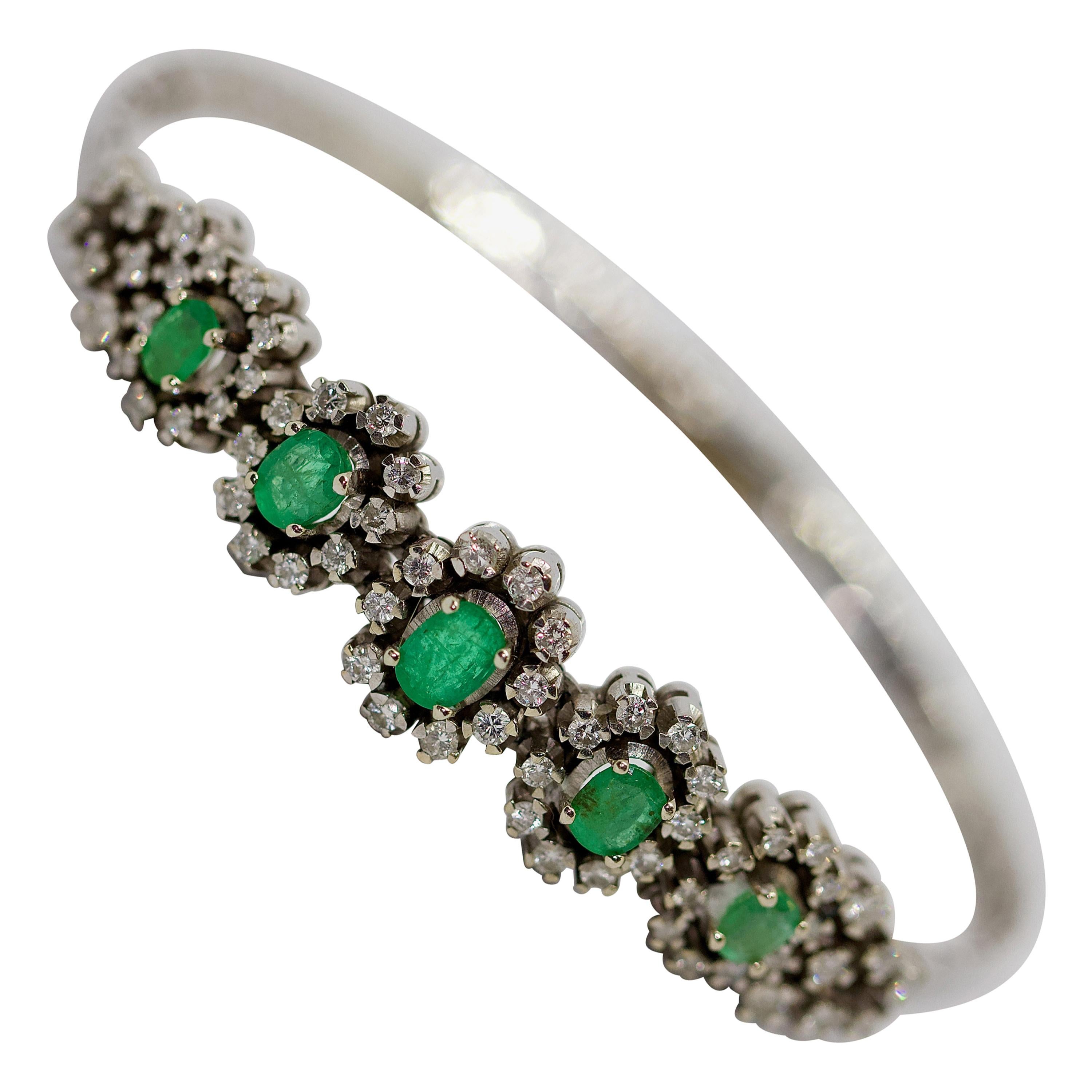 White Gold Tennis Bracelet with Emeralds and Diamonds For Sale