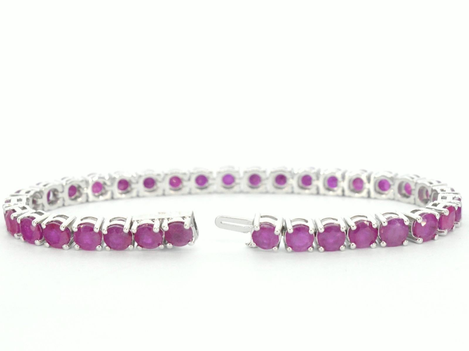 Contemporary White Gold Tennis Bracelet with Rubies For Sale