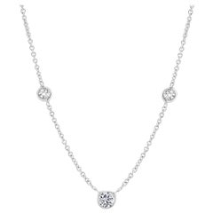 Three Graduating Diamond Bezel-Set White Gold Pendant Weighing 0.45 Carat