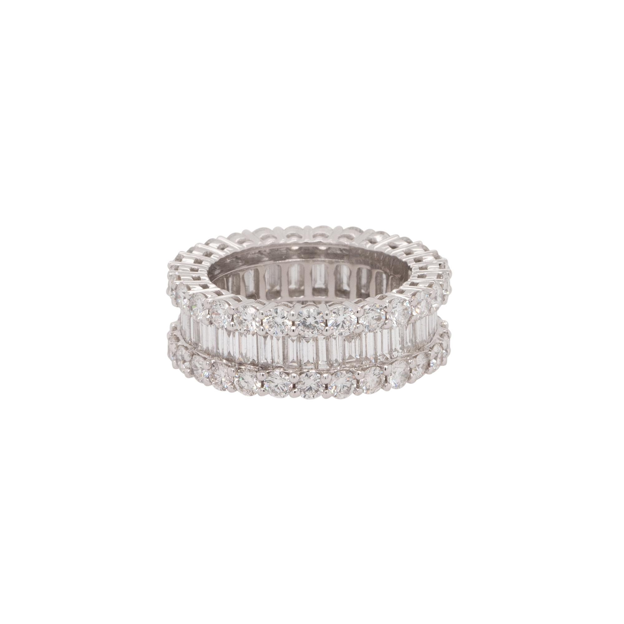 Material: 18k White Gold
Diamond Details: Approx. 5ctw of round cut & baguette cut Diamonds. Diamonds are G/H in color and VS in clarity
Ring Measurements: 24mm x 8mm x 24mm
Ring Size: 7
Total Weight: 8.1g (5.2dwt)
Additional Details: This item