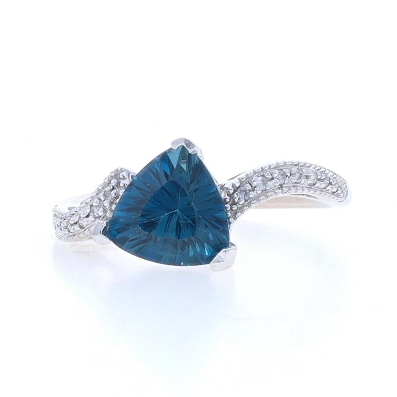 Size: 6 3/4
Sizing Fee: Up 1 1/2 sizes for $35 or Down 1 size for $35

Metal Content: 14k White Gold

Stone Information

Natural Topaz
Treatment: Routinely Enhanced
Carat(s): 1.76ct
Cut: Fantasy Cut Trillion
Color: London Blue

Natural