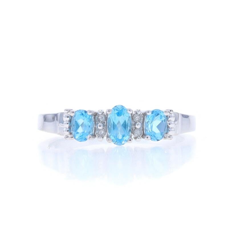 Size: 7
Sizing Fee: Up 2 sizes for $35 or Down 2 sizes for $35

Metal Content: 10k White Gold

Stone Information

Natural Topaz
Treatment: Routinely Enhanced
Carat(s): .60ctw
Cut: Oval
Color: Blue

Natural Diamonds
Carat(s): .04ctw
Cut: