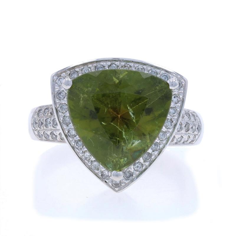 Size: 7
Sizing Fee: Up 2 sizes for $60 or Down 1 size for $40

Metal Content: 14k White Gold

Stone Information

Natural Tourmaline
Carat(s): 7.15ct
Cut: Trillion

Natural Diamonds
Carat(s): .37ctw
Cut: Round Brilliant
Color: J - K
Clarity: SI2 -