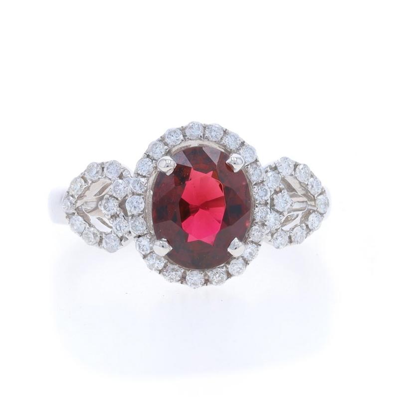 Size: 5 1/2
Sizing Fee: Up 2 1/2 sizes for $40 or Down 1 size for $40

Metal Content: 18k White Gold

Stone Information

Natural Tourmaline
Carat(s): 1.57ct (weighed)
Cut: Oval
Color: Purplish Red

Natural Diamonds
Carat(s): .31ctw (carat