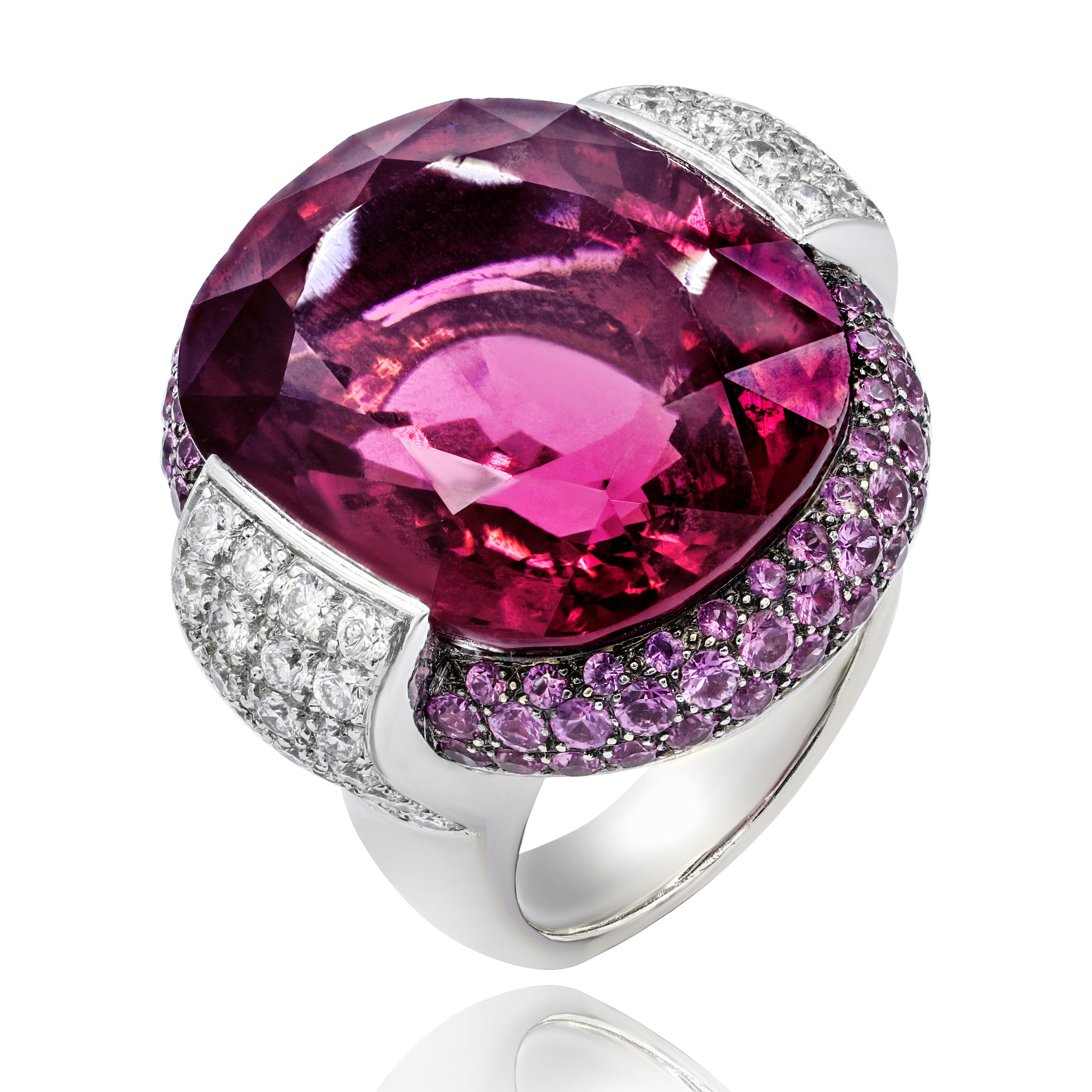 Fashion 18K White gold tourmaline diamond ring with center 35.00 ct tourmaline oval shape in a pink sapphire halo features 3.00 ct and diamonds on the sides features 2.00 ct round diamonds
