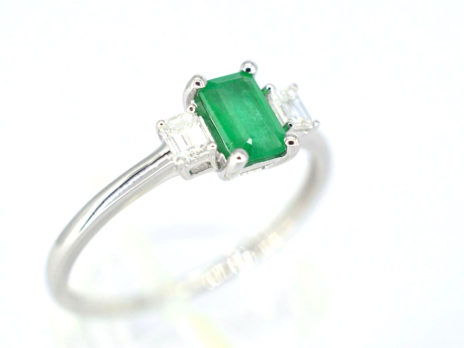 Emerald Cut White Gold Trinity Ring with Diamonds and Emerald For Sale