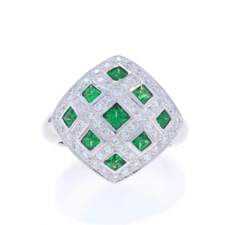 Size: 5 1/2
Sizing Fee: Up 1/2 a size for $60 or Down 1/2 a size for $60

Metal Content: 18k White Gold

Stone Information

Natural Tsavorite Garnets
Carat(s): 1.12ctw
Cut: Square
Color: Green

Natural Diamonds
Carat(s): .60ctw
Cut: Round