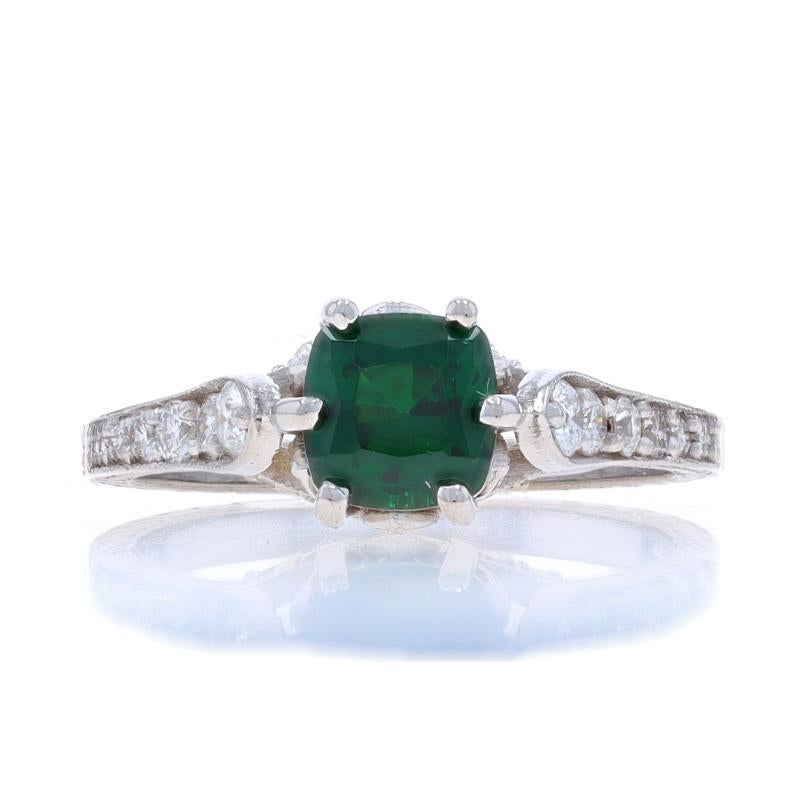 Size: 6
Sizing Fee: Up 1 1/2 sizes for $60 or Down 1/2 a size for $40

Metal Content: 18k White Gold

Stone Information

Natural Tsavorite Garnet
Carat(s): .90ct
Cut: Cushion
Color: Green

Natural Diamonds
Carat(s): .60ctw
Cut: Round