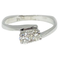 Anello con due diamanti in oro bianco