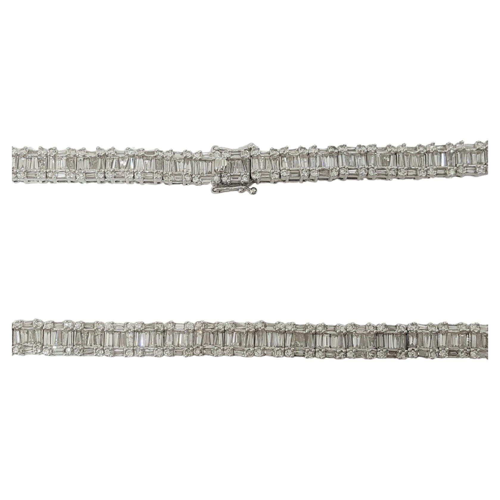 White Gold Unisex 20.52 ct Total Weight Round Brilliant & Baguette Cut Diamonds Necklace. 

17 inches long

Consider that for this quality and handmandcraft this jewel will cost much more in the market.