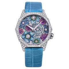 Orologio in oro bianco con diamanti bianchi e micromosaico