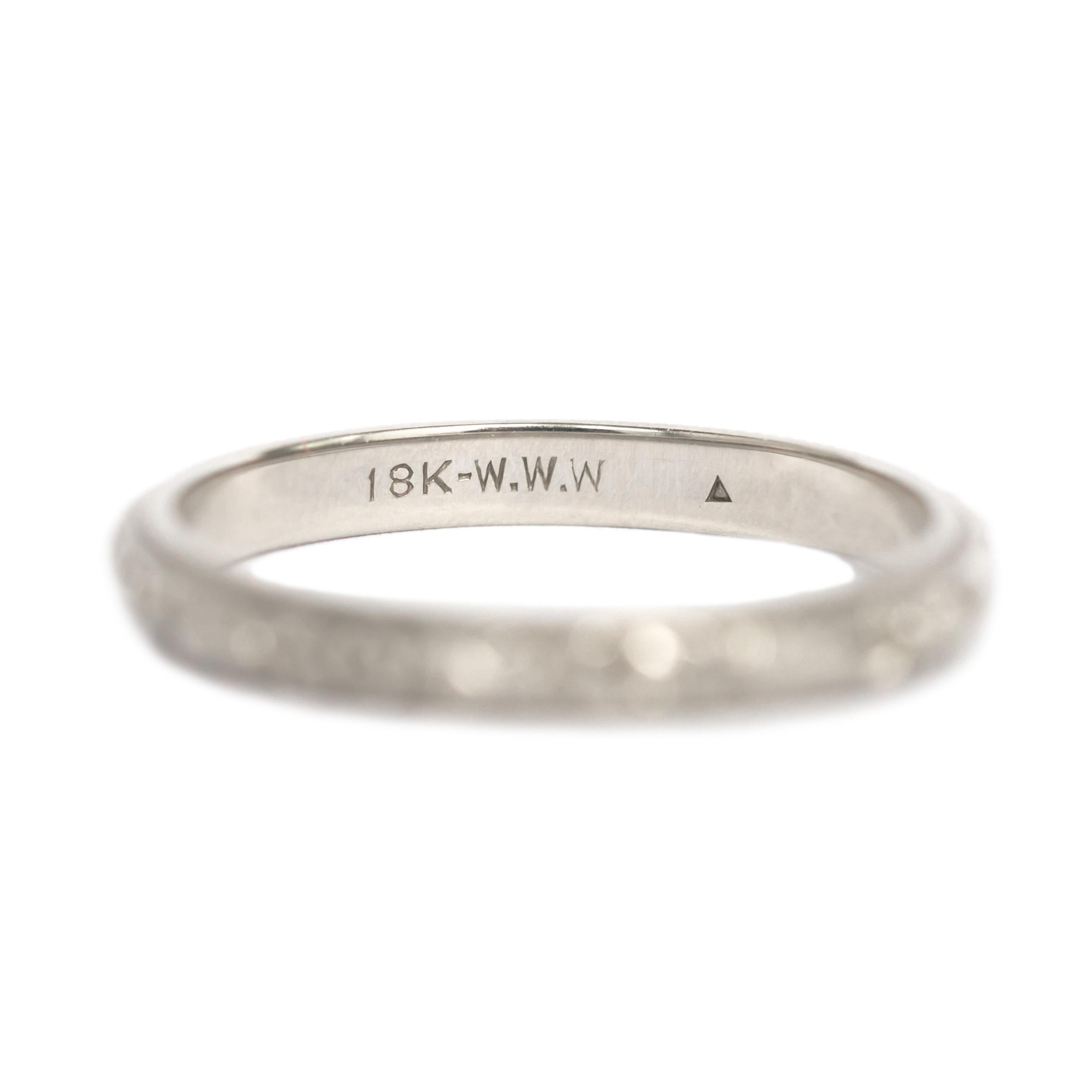 Ring Size: 7.90
Metal Type: 18 karat White Gold 
Weight: 2.9 grams


Finger to Top of Stone Measurement: 1.67mm
Width: 2.45mm