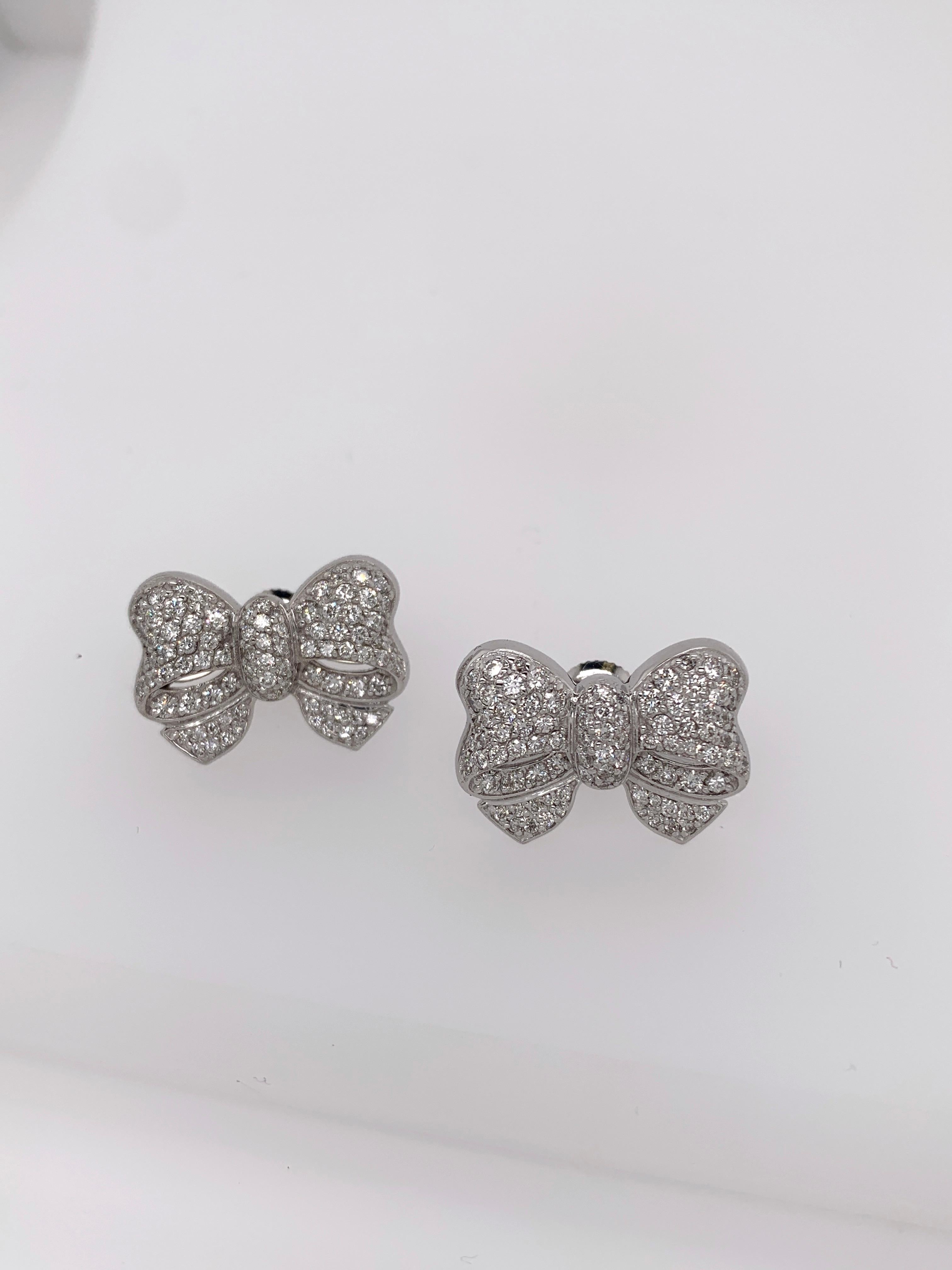 The  Bow Earrings
White Diamonds set on White Gold Bows.
Crafted to order. Please allow up to 3 weeks for delivery.