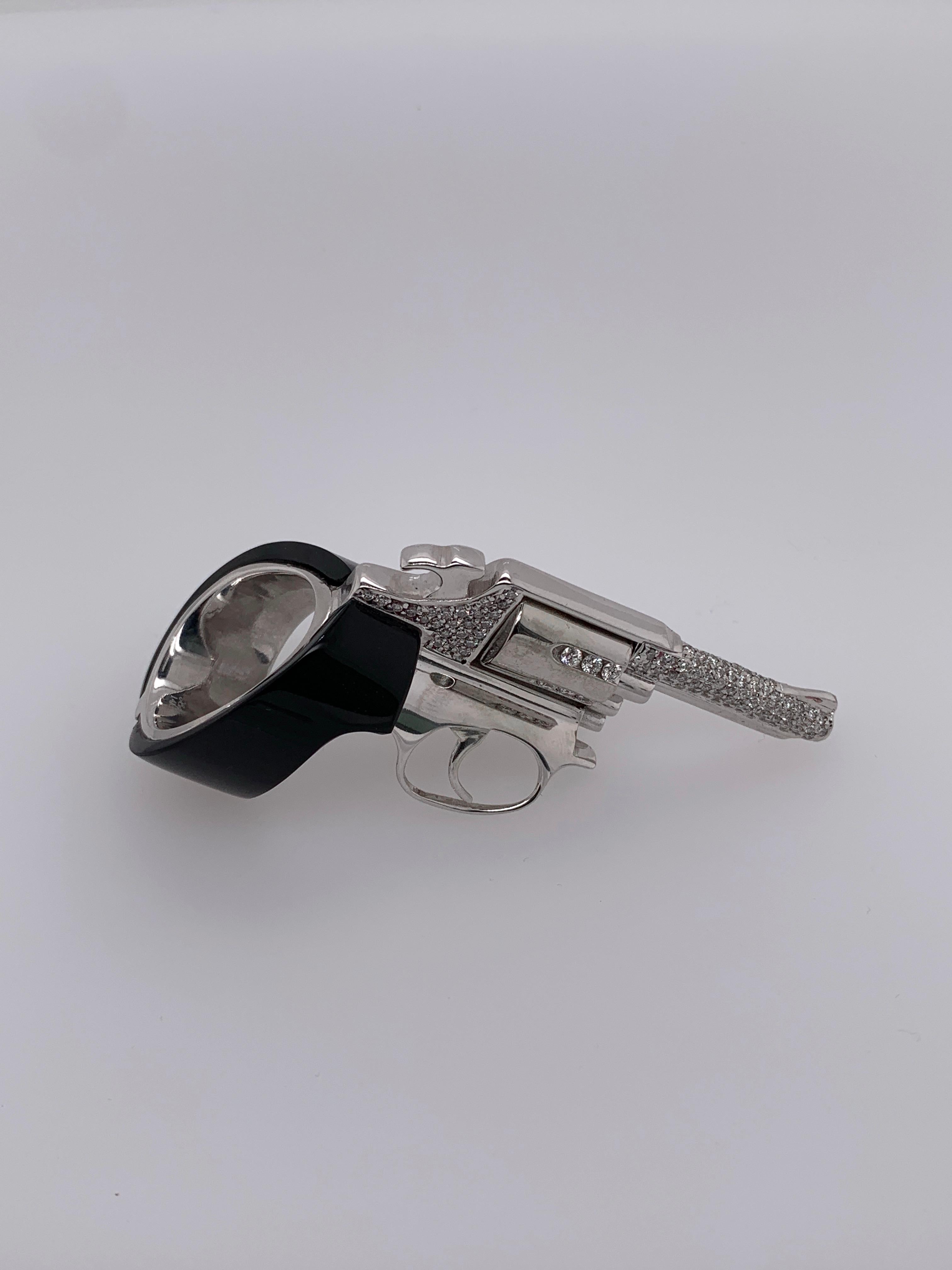 The Revolver Ring
White Diamonds set on White Gold.
Crafted to order. Please allow up to 3 weeks for delivery.