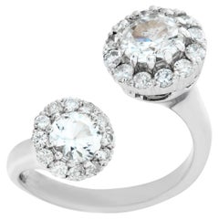White gold white sapphire and diamond ring with halo diamonds
