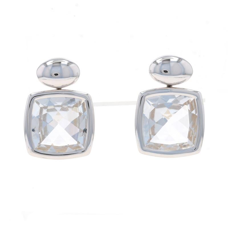 Brand: A & Furst

Metal Content: 18k White Gold

Stone Information

Natural White Topaz
Carat(s): 11.80ctw
Cut: Square Cushion

Total Carats: 11.80ctw

Style: Dangle
Fastening Type: Butterfly Closures

Measurements

Tall: 27/32