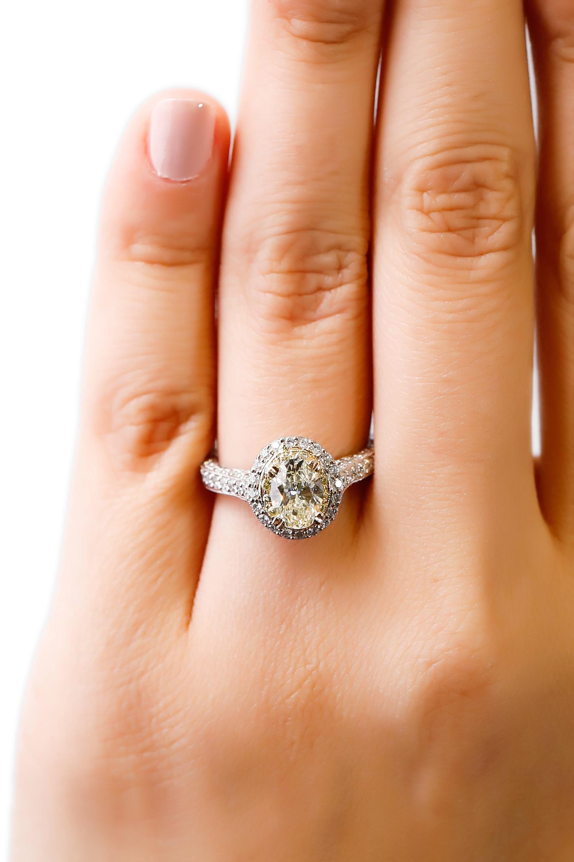 Oval Cut 14 Karat White Gold Yellow Diamond Halo Engagement Ring Designed by Natalie K