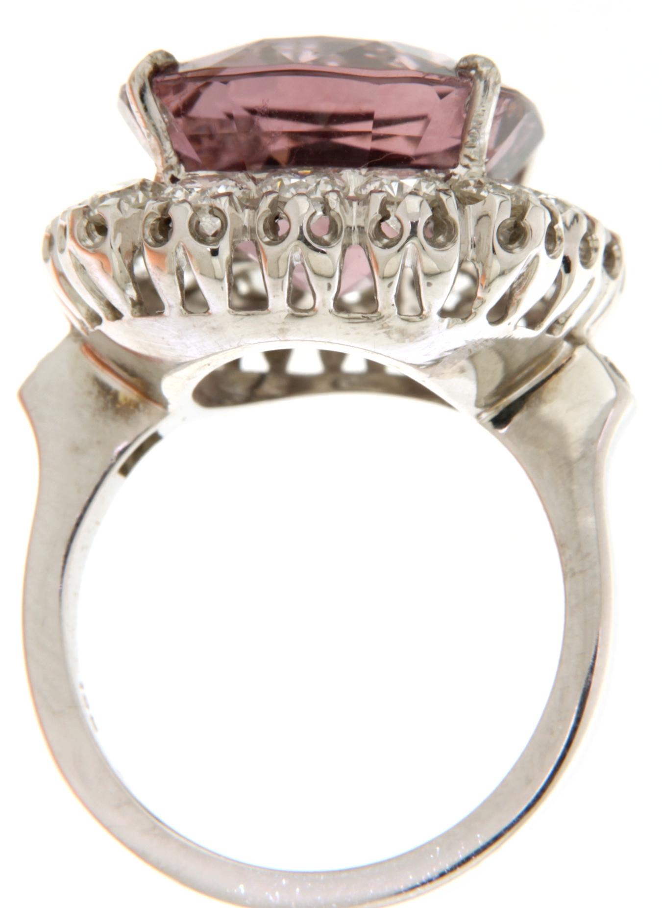 18kt Solid White Gold Diamond Ring 15.80ct Natural Pink N/H Spinel. 

Exceptional and very rare Natural 15.80 ct Natural Spinel & diamond ring.

A magnificent jewel for every occasion or natural stone collection.

Ring Size : 55 1/2 eu

Spinel :