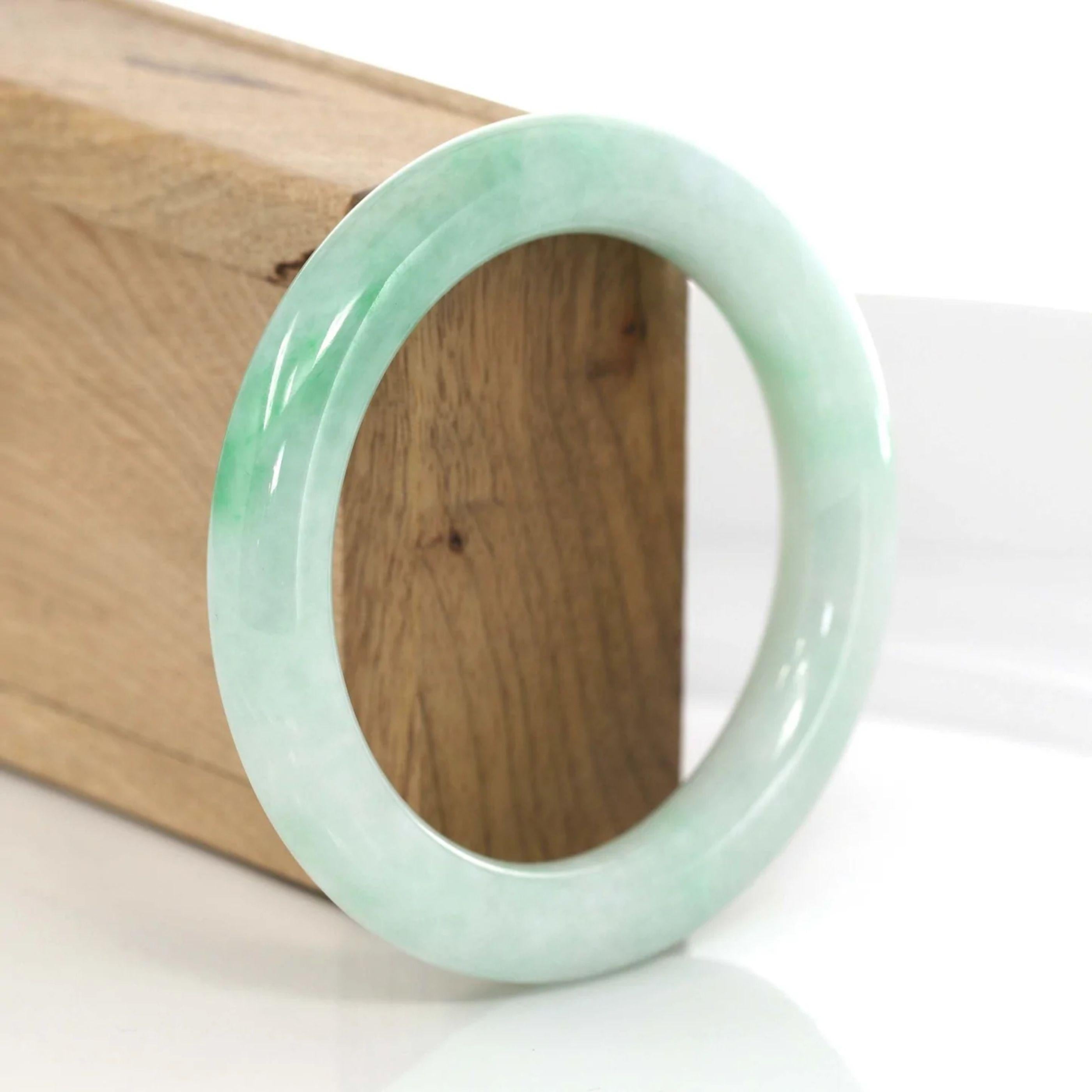 * DETAILS---This bangle is made with genuine green Jadeite jade, the jade texture is very smooth with white jade. The green color and translucent white texture are truly a mesmerizing combination. The Classic round style bracelet is gorgeous and