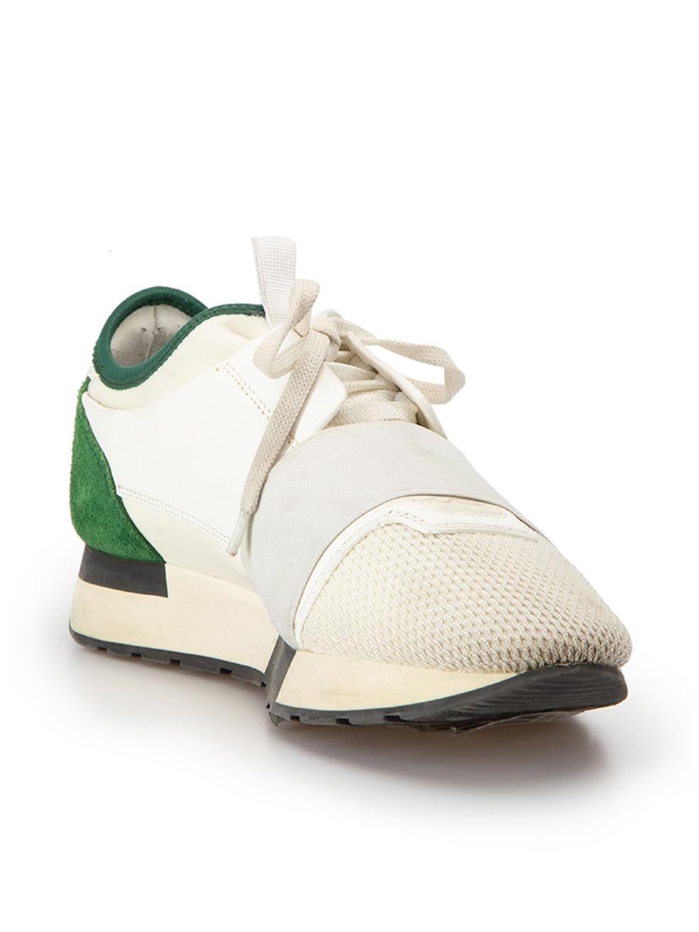 CONDITION is Good. General wear to shoes is evident. Moderate signs of wear to elastic straps on both shoes and mesh with discolouration throughout both, slight scuffing to side panels on both shoes and soles on this used Balenciaga designer resale