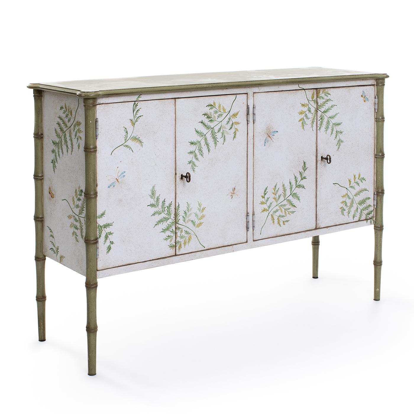 Introducing the large Lombardia Bamboo cabinet, a true delight for your space. Featuring apple-green bamboo and playful butterflies, this whimsical cabinet is a source of joy and amusement. Its larger size allows for ample storage while maintaining